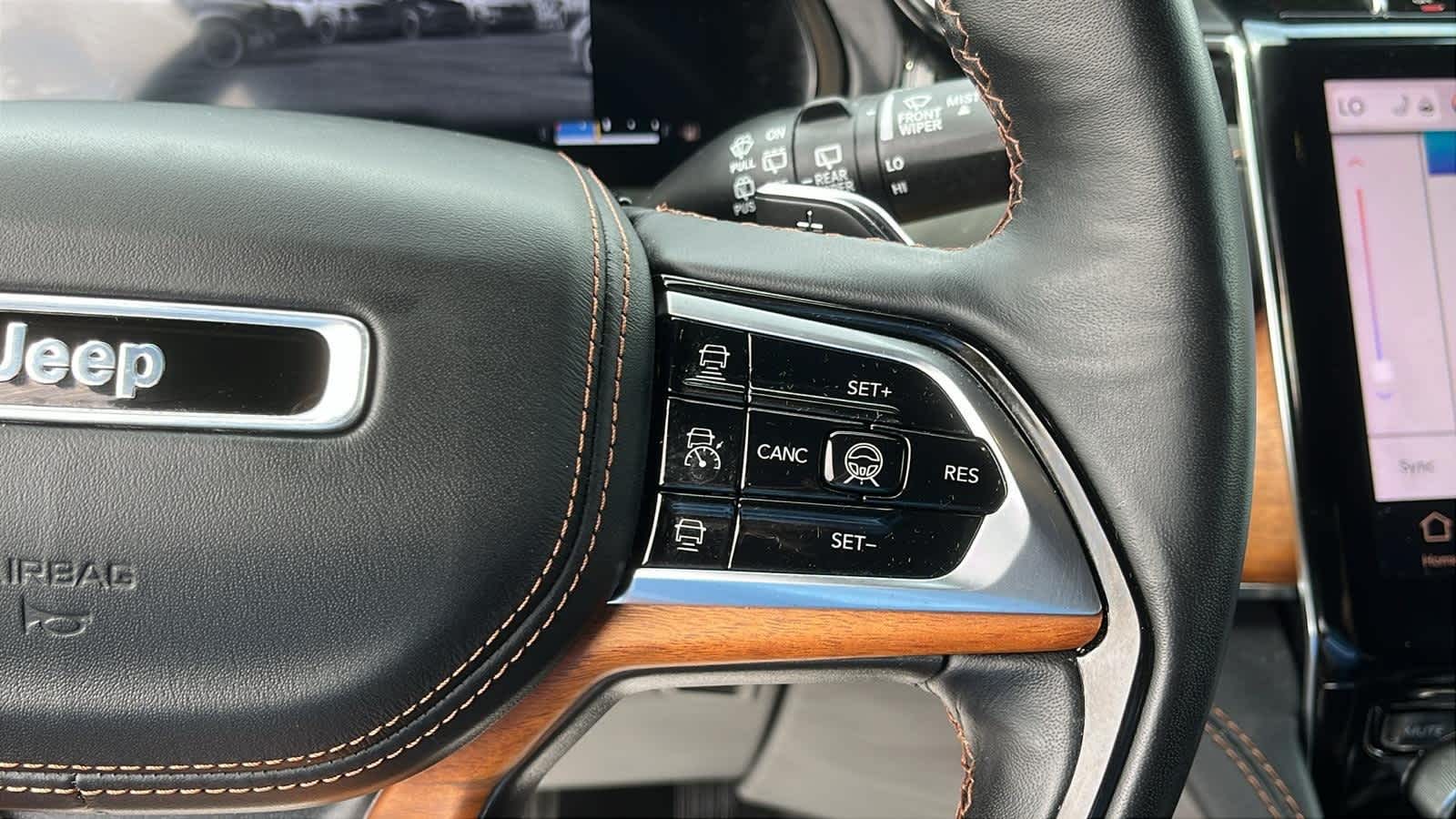 used 2022 Jeep Grand Cherokee car, priced at $48,493