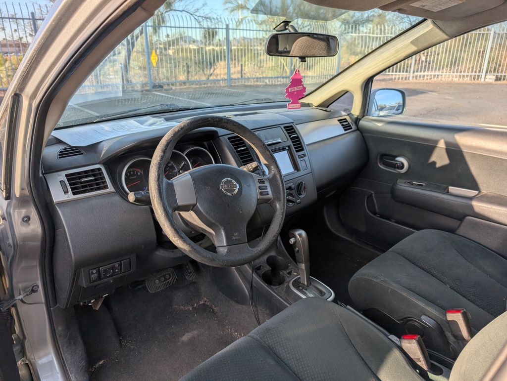 used 2011 Nissan Versa car, priced at $6,000