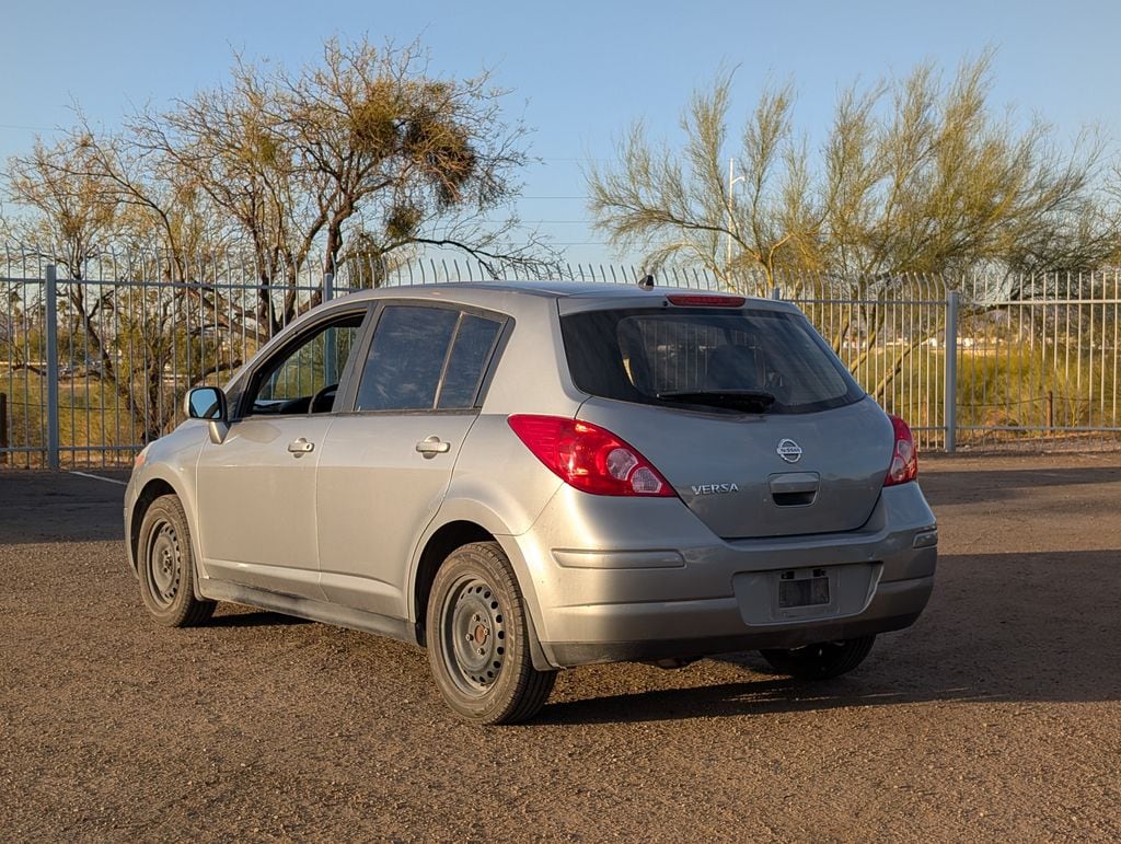 used 2011 Nissan Versa car, priced at $6,000