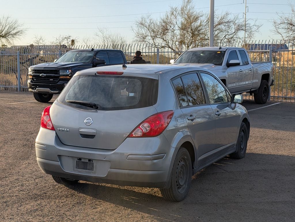 used 2011 Nissan Versa car, priced at $6,000