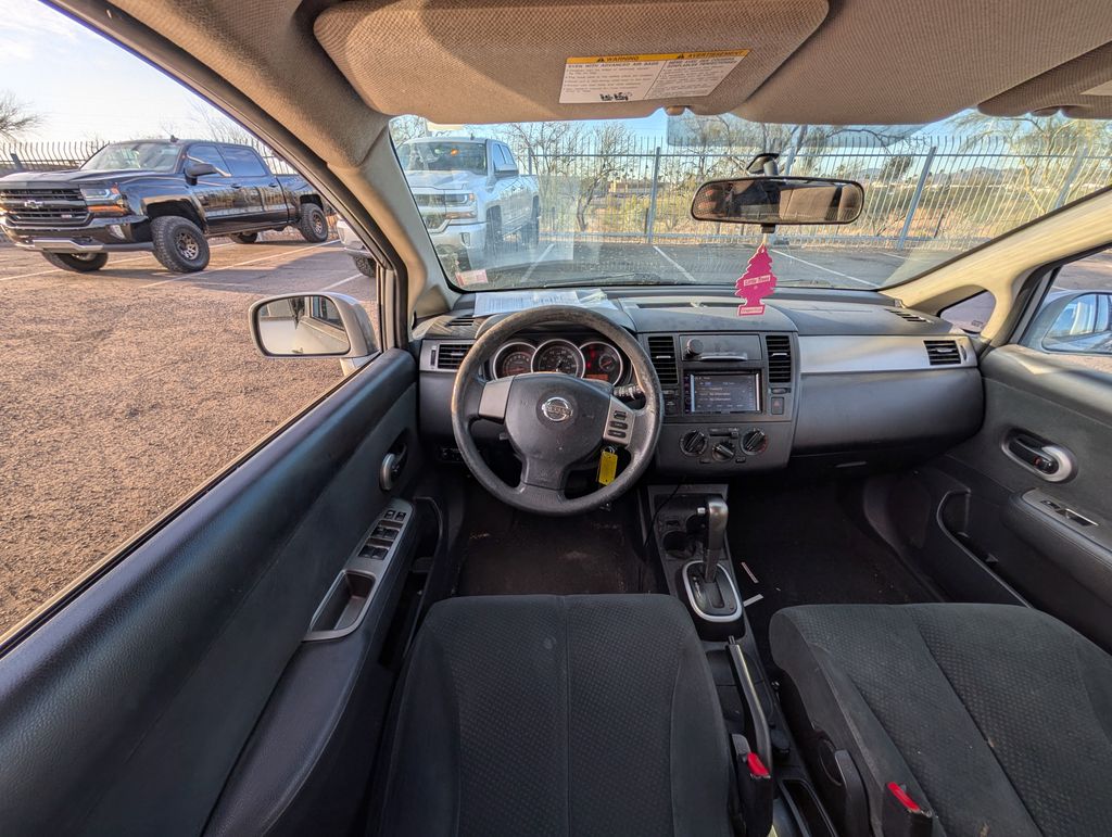 used 2011 Nissan Versa car, priced at $6,000