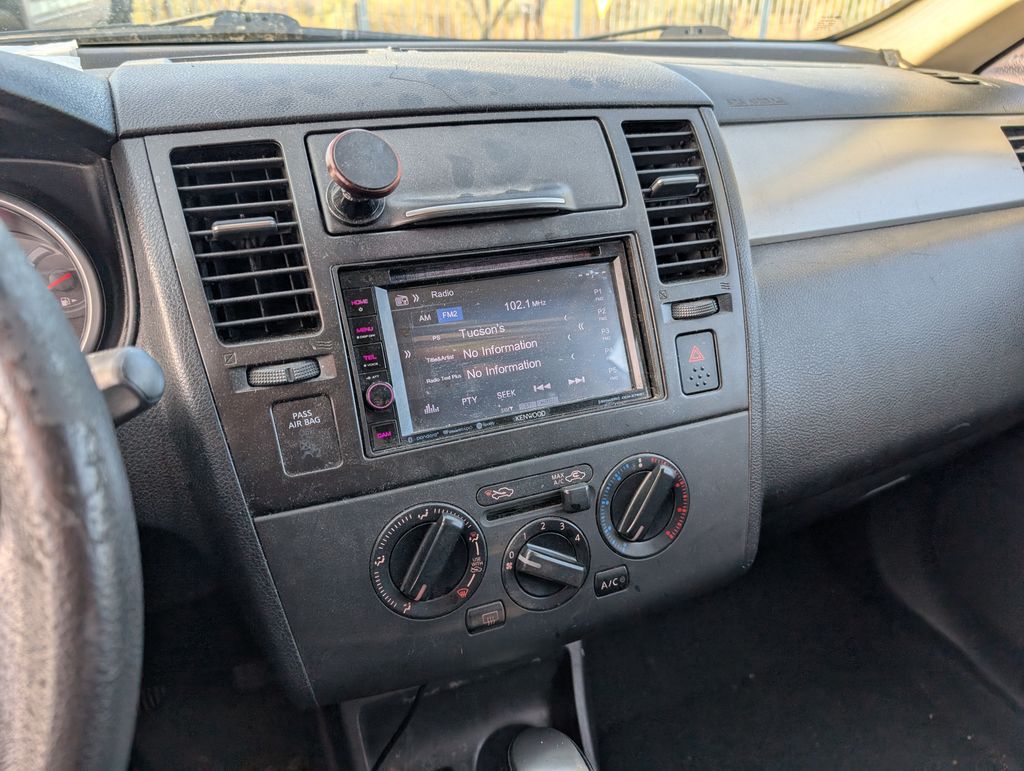 used 2011 Nissan Versa car, priced at $6,000